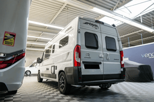 allgallery 40 a white van in a building